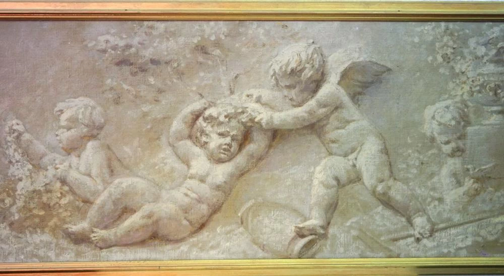 Suppraporte con putti giocanti in rilievo marmoreo - dettaglio